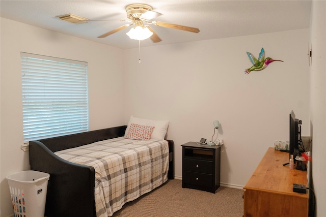 6014 Ghana Ln, Pasadena, TX 77505 - bedroom featuring light carpet and a ceiling fan