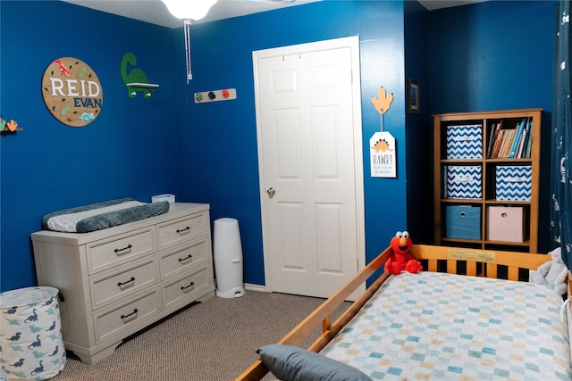 6014 Ghana Ln, Pasadena, TX 77505 - carpeted bedroom with baseboards