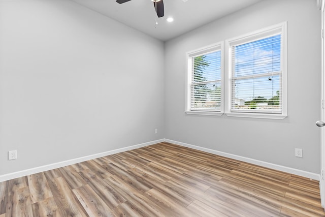 1505 Hussion St, Houston, TX 77003 - spare room featuring baseboards, ceiling fan, light wood-type flooring, and recessed lighting