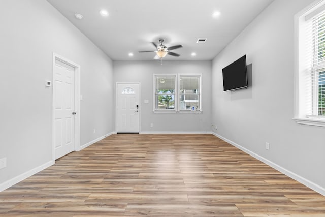 1505 Hussion St, Houston, TX 77003 - entryway with a ceiling fan, recessed lighting, healthy amount of natural light, and light wood-style floors