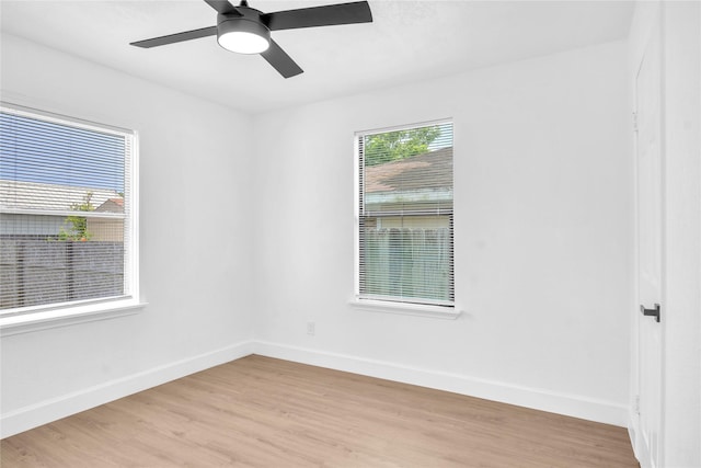607 Rosedale St, La Marque, TX 77568 - empty room with baseboards, light wood finished floors, and ceiling fan