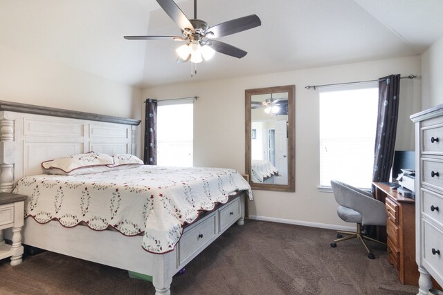 14726 Meadow Acre Trl, Houston, TX 77049 - bedroom featuring dark colored carpet, baseboards, vaulted ceiling, a ceiling fan, and an office area