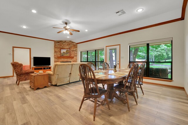 210 Harbor Run Dr, Coldspring, TX 77331 - dining space with plenty of natural light, ceiling fan, ornamental molding, light wood-type flooring, and baseboards