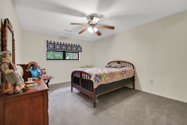 210 Harbor Run Dr, Coldspring, TX 77331 - carpeted bedroom with baseboards and a ceiling fan