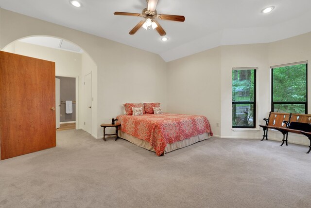210 Harbor Run Dr, Coldspring, TX 77331 - bedroom featuring carpet, arched walkways, lofted ceiling, recessed lighting, and baseboards