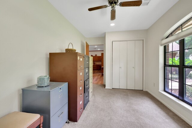 210 Harbor Run Dr, Coldspring, TX 77331 - bedroom with light carpet, a closet, a ceiling fan, baseboards, and recessed lighting