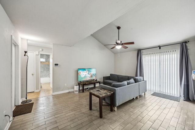 16211 Beck Ridge Dr, Houston, TX 77053 - living area featuring a ceiling fan, vaulted ceiling, light wood-type flooring, and baseboards