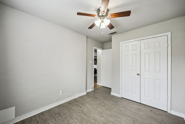 16211 Beck Ridge Dr, Houston, TX 77053 - unfurnished bedroom featuring wood finished floors, baseboards, and a closet