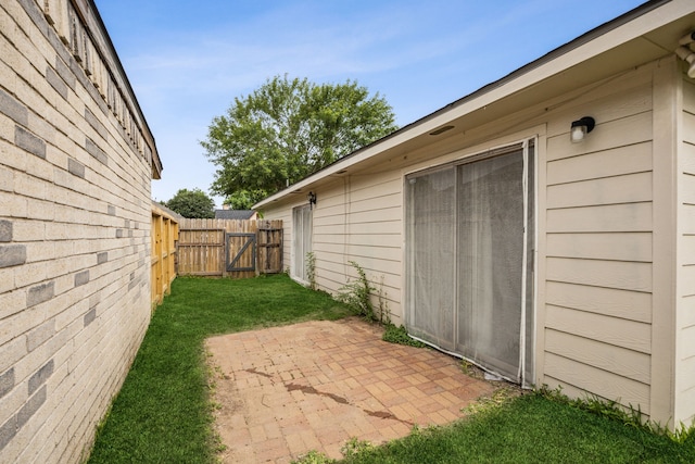 16211 Beck Ridge Dr, Houston, TX 77053 - view of yard with a gate and a patio