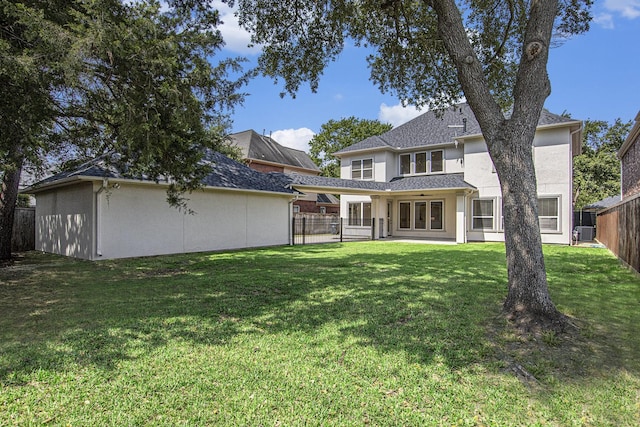 3123 Bonnebridge Way Blvd, Houston, TX 77082 - rear view of house with stucco siding and a patio