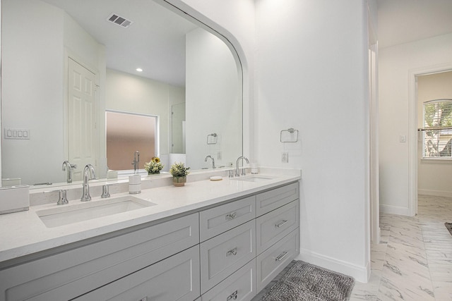 3123 Bonnebridge Way Blvd, Houston, TX 77082 - full bathroom featuring baseboards, marble finish flooring, double vanity, and recessed lighting
