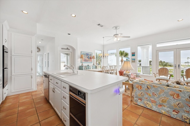 4100 Sand Crab Ln, Galveston, TX 77554 - kitchen with a sink, light tile patterned flooring, ceiling fan, dishwasher, and recessed lighting