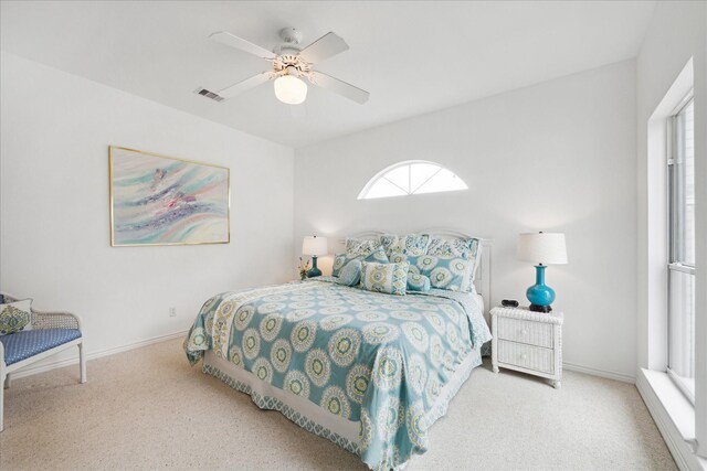 4100 Sand Crab Ln, Galveston, TX 77554 - carpeted bedroom featuring baseboards and ceiling fan
