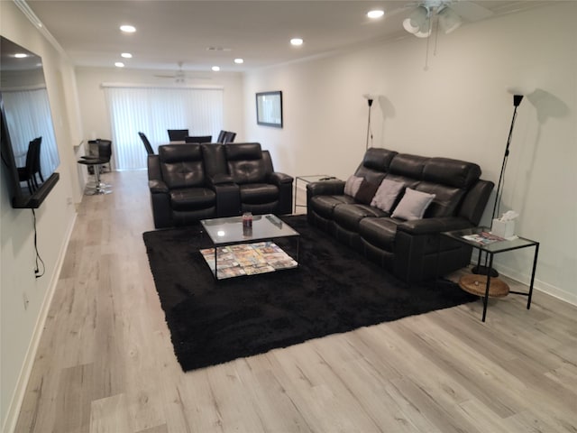 12907 Trail Hollow Dr Unit 2907, Houston, TX 77079 - living area with a ceiling fan, wood finished floors, recessed lighting, baseboards, and ornamental molding