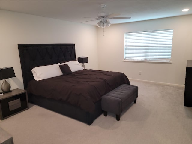 12907 Trail Hollow Dr Unit 2907, Houston, TX 77079 - carpeted bedroom featuring baseboards and ceiling fan