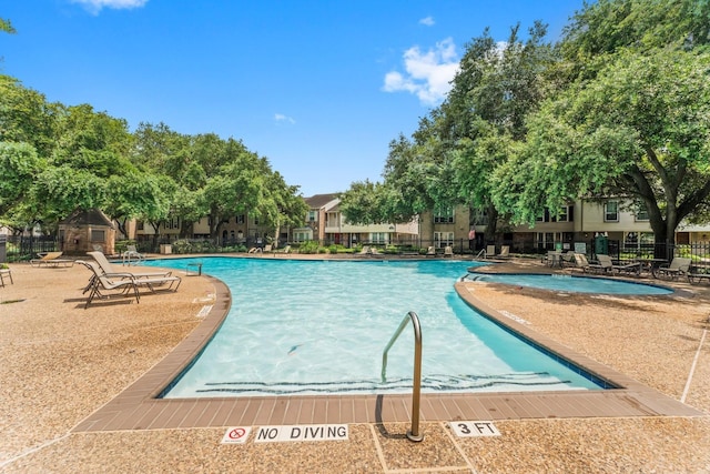 12907 Trail Hollow Dr Unit 2907, Houston, TX 77079 - community pool with a patio area