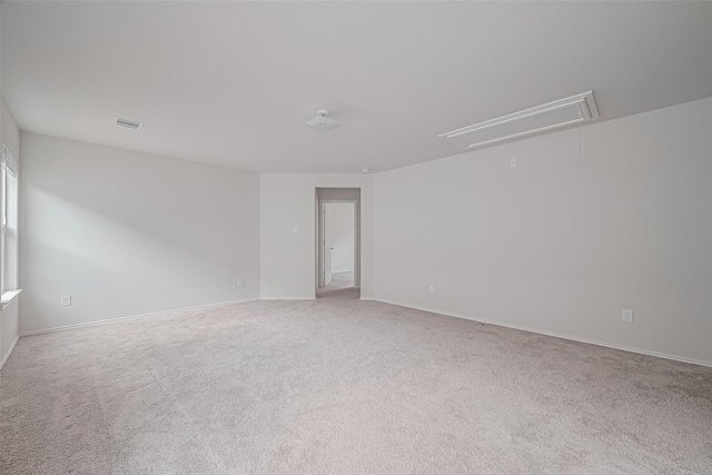 15502 Islandview Ln, Houston, TX 77053 - unfurnished room featuring attic access, carpet flooring, and baseboards