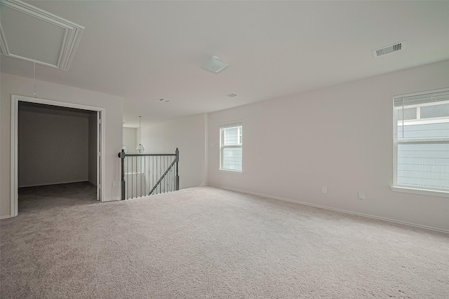 15502 Islandview Ln, Houston, TX 77053 - carpeted spare room featuring attic access and baseboards