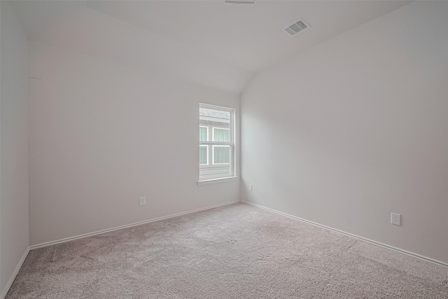 15502 Islandview Ln, Houston, TX 77053 - carpeted empty room featuring vaulted ceiling and baseboards