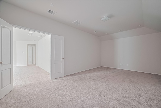 15502 Islandview Ln, Houston, TX 77053 - unfurnished room featuring light colored carpet, vaulted ceiling, and baseboards