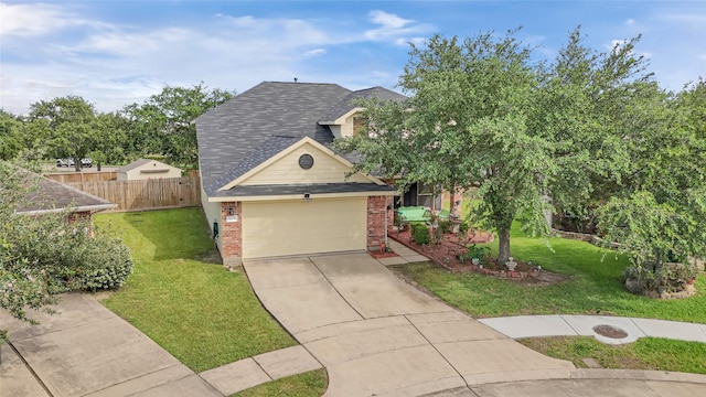 14251 Winecup Ln, Houston, TX 77047 - view of front of property featuring brick siding, driveway, a garage, and a shingled roof