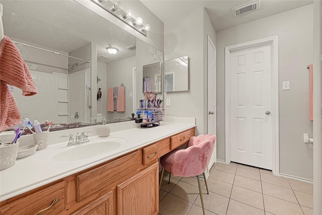 14251 Winecup Ln, Houston, TX 77047 - bathroom featuring tile patterned flooring, vanity, and baseboards