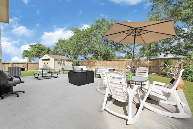 14251 Winecup Ln, Houston, TX 77047 - view of patio / terrace featuring outdoor dining area and central AC unit