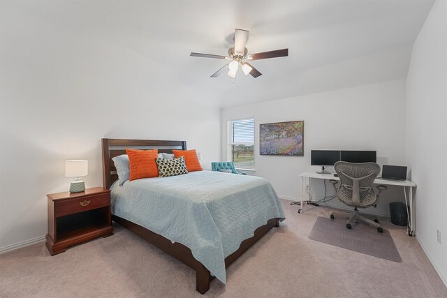 12526 Sabine Point Dr, Humble, TX 77346 - carpeted bedroom featuring an office area, baseboards, and ceiling fan