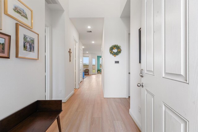 12526 Sabine Point Dr, Humble, TX 77346 - hallway featuring light wood-style floors, recessed lighting, and baseboards