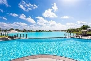 12526 Sabine Point Dr, Humble, TX 77346 - community pool featuring a water view