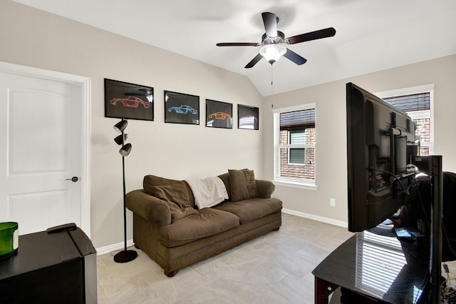 3864 Oakmist Bend Ln, Spring, TX 77386 - living area featuring ceiling fan, baseboards, and lofted ceiling