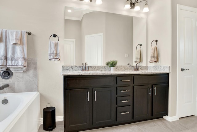 3864 Oakmist Bend Ln, Spring, TX 77386 - bathroom with double vanity, a garden tub, ornamental molding, and baseboards