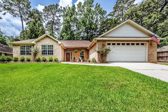 717 Overbrook, Huntsville, TX 77340 - single story home featuring brick siding, driveway, and a garage