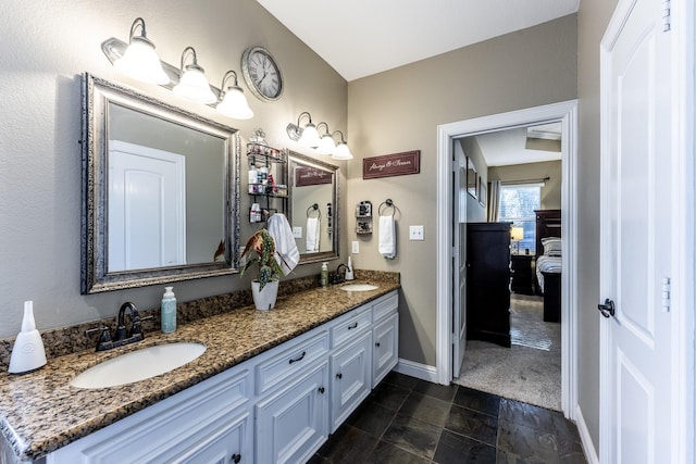 717 Overbrook, Huntsville, TX 77340 - full bathroom featuring baseboards and double vanity