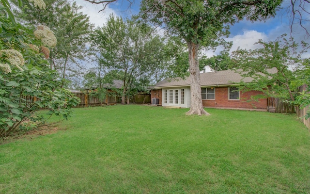 4621 W 43rd St, Houston, TX 77092 - view of yard featuring french doors