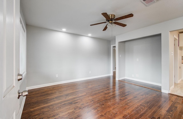 4621 W 43rd St, Houston, TX 77092 - empty room with ceiling fan, dark wood-type flooring, recessed lighting, and baseboards