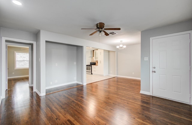 4621 W 43rd St, Houston, TX 77092 - unfurnished living room featuring ceiling fan, a chandelier, baseboards, and dark wood finished floors
