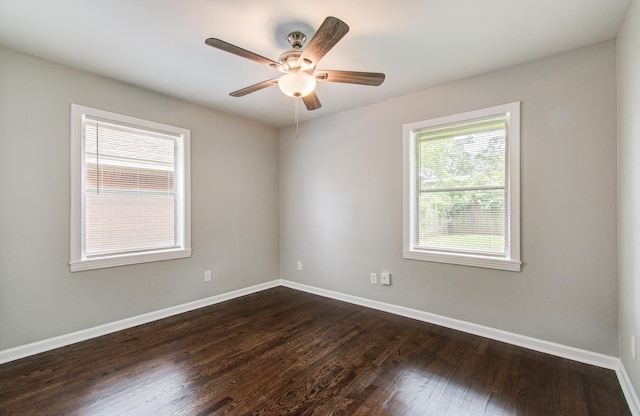 4621 W 43rd St, Houston, TX 77092 - empty room with dark wood-style flooring, baseboards, and a ceiling fan