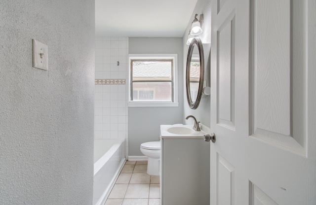 4621 W 43rd St, Houston, TX 77092 - bathroom featuring tile patterned flooring, toilet, vanity, and a textured wall