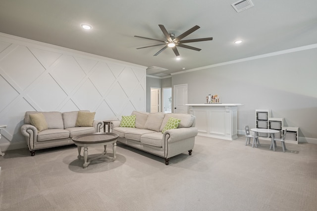 25007 Coperti Ln, Spring, TX 77386 - living room featuring crown molding, a ceiling fan, a decorative wall, light colored carpet, and recessed lighting