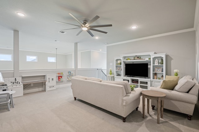 25007 Coperti Ln, Spring, TX 77386 - living area with light carpet, ceiling fan, ornamental molding, and recessed lighting