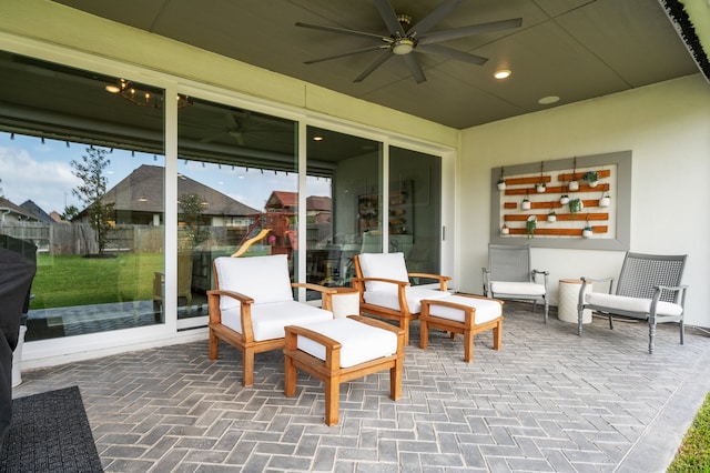 25007 Coperti Ln, Spring, TX 77386 - view of patio featuring a ceiling fan and a playground