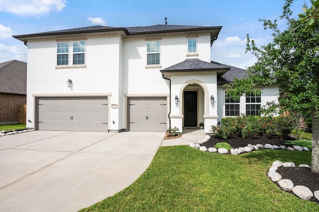 25007 Coperti Ln, Spring, TX 77386 - view of front of house with stucco siding, an attached garage, driveway, and a front yard