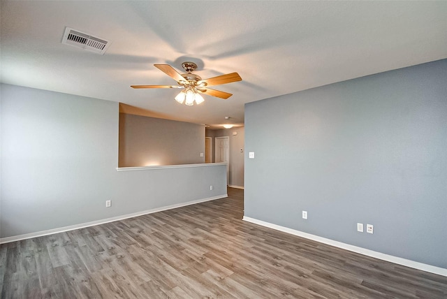 1230 Piedmont Creek Trl, Houston, TX 77073 - empty room with wood finished floors, a ceiling fan, and baseboards