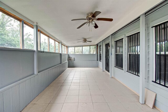 1230 Piedmont Creek Trl, Houston, TX 77073 - unfurnished sunroom featuring a ceiling fan