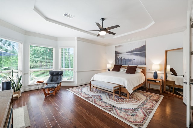 5451 Harvest Oak Landing Dr, Spring, TX 77386 - bedroom with a raised ceiling, wood-type flooring, and crown molding