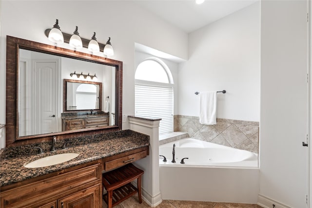 5451 Harvest Oak Landing Dr, Spring, TX 77386 - full bath with a whirlpool tub, vanity, and tile patterned flooring