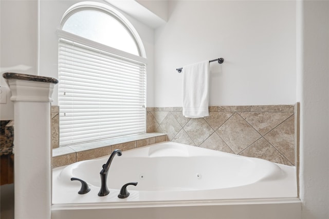 5451 Harvest Oak Landing Dr, Spring, TX 77386 - bathroom with a tub with jets