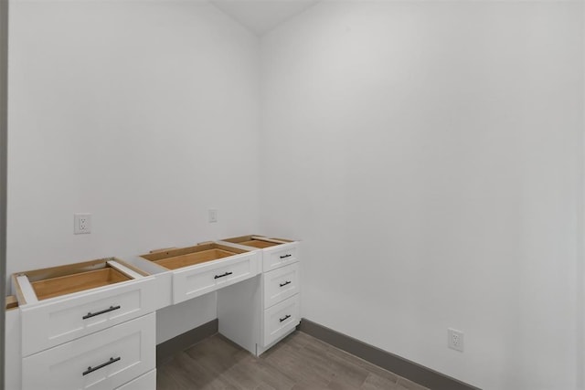 1806 Athens Dr, Roman Forest, TX 77357 - bathroom with wood finished floors and baseboards