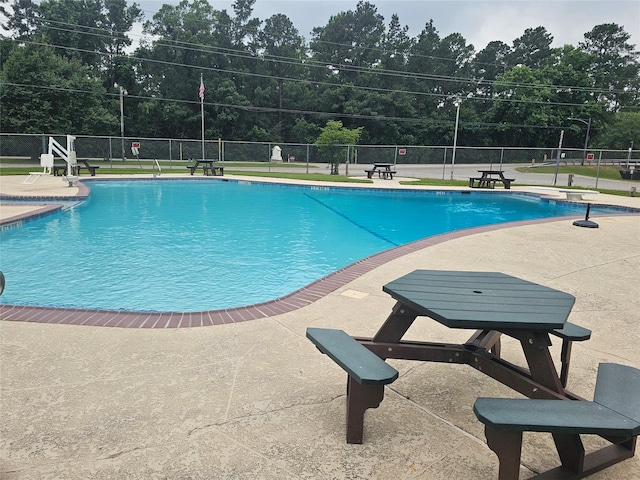 1806 Athens Dr, Roman Forest, TX 77357 - community pool with a patio area
